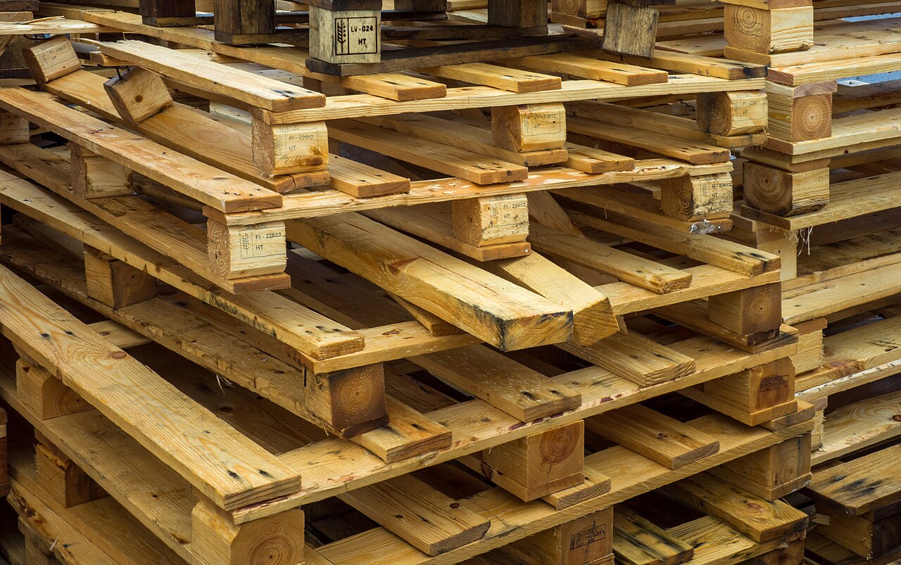 Close view of stacked wooden pallets